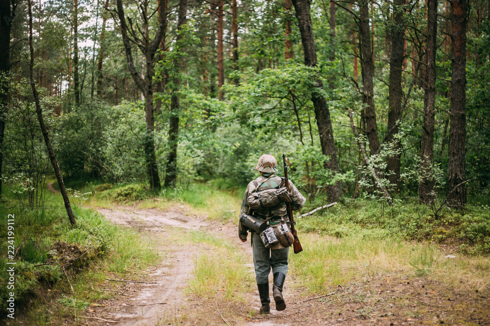 German Wehrmacht Infantry Soldier In World War II Marching Walki