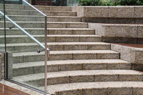 Closeup of modern designed outdoor marble stairs after raining. 