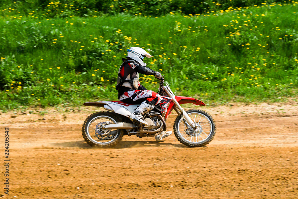 Motocross rider in the action