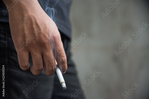 Man smoking a cigarette.