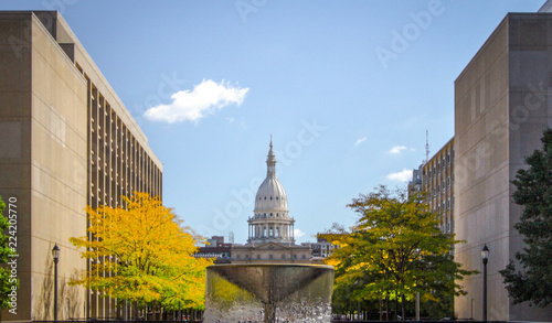 Lansing Michigan State Capitol Building. The state capital of Michigan with fall foliage on the downtown streets of Lansing Michigan. photo