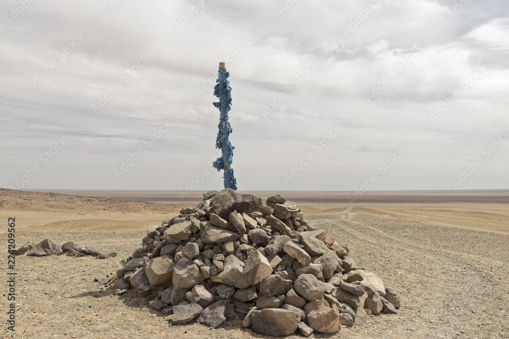 Gobi Desert - a prayer mound made of stones. Gobi Desert - a prayer mound made of stones.