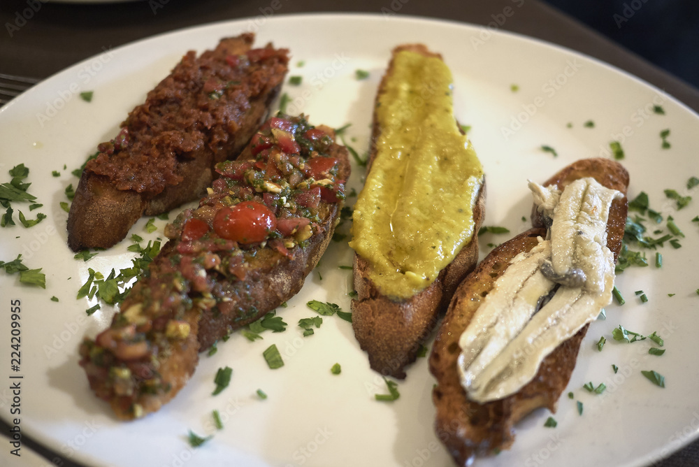 Assorted bruschetta as a starter