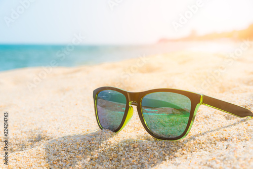Sunglasses on the sandy coast