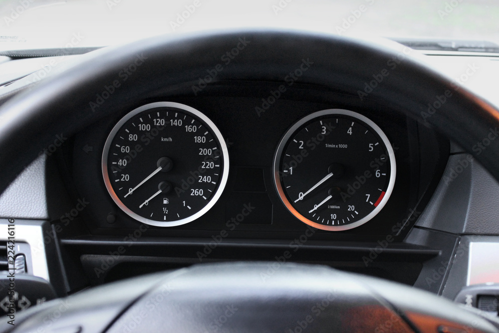 Car dashboard, illuminated panel, speed display