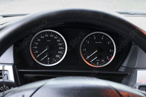 Car dashboard, illuminated panel, speed display © Stasiuk