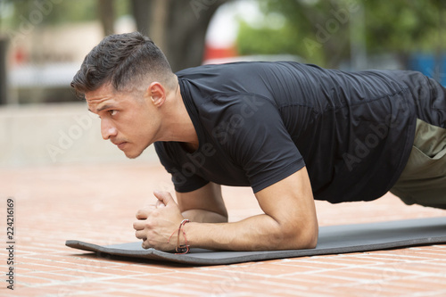 Man doing fitness in outdoor park © jcfotografo