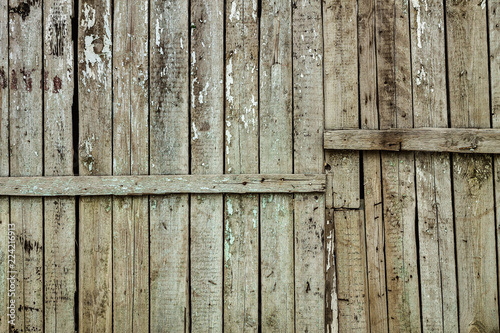 Wooden background of old weathered boards