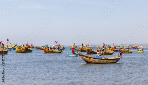 Fishing harbor full of boats in a bay in Mui Ne, Vietnam