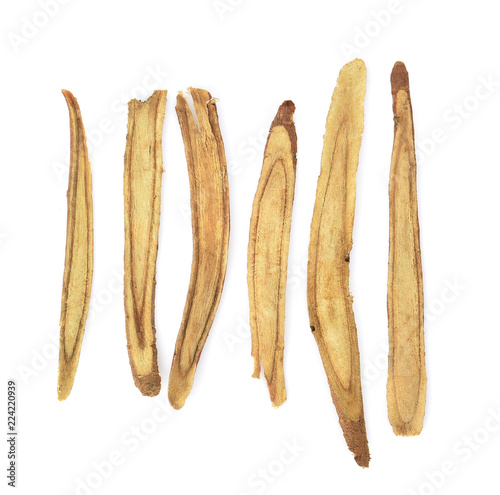 Slice Licorice roots on white background