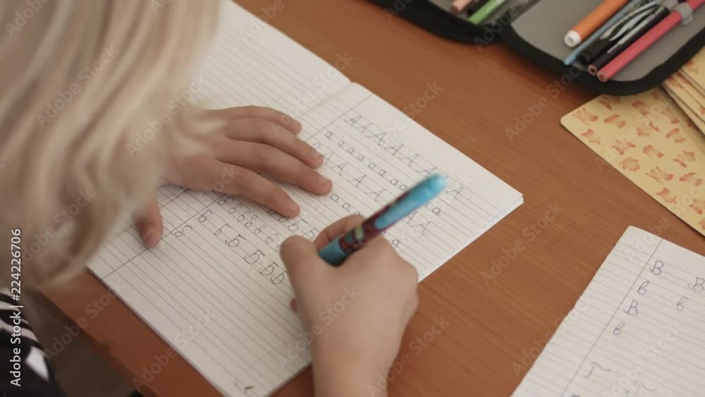 Blonde Primary School Child Writing Homework Blonde Primary School Child Writing Homework