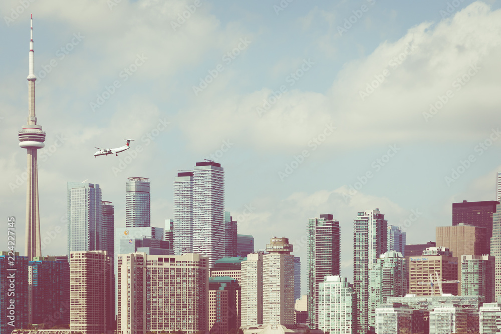 Toronto skyline and landing plane. Toronto, Ontario, Canada.
