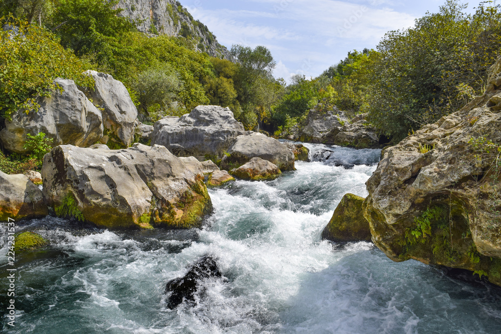 Rapids and rocks on the Cetina River in Omis, Croatia 