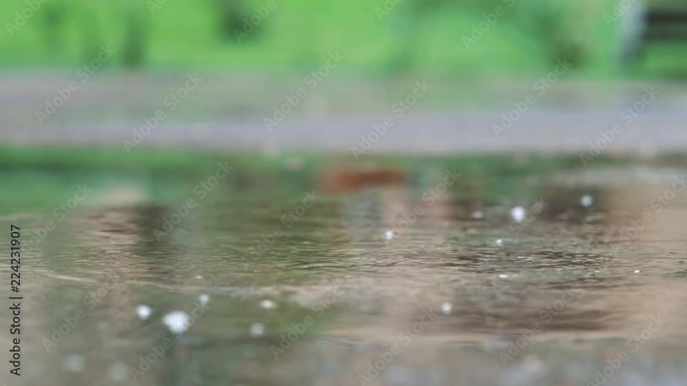 Man in black shoes stepping into the puddle in 4k slow motion 60fps Man in black shoes stepping into the puddle in 4k slow motion 60fps