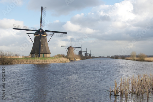 Mills at water in polder landscape kinderdijk