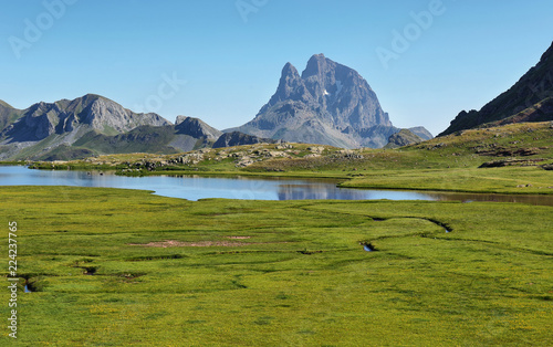 Pic du Midi d Ossau reflecting in Anayet lake, Spanish Pyrenees, Aragon, Spain photo