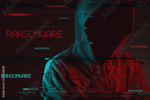 Ransomware concept with faceless hooded male person