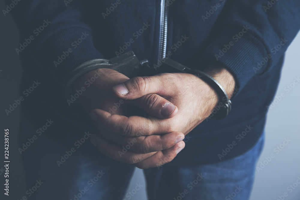 Man hands with handcuffs