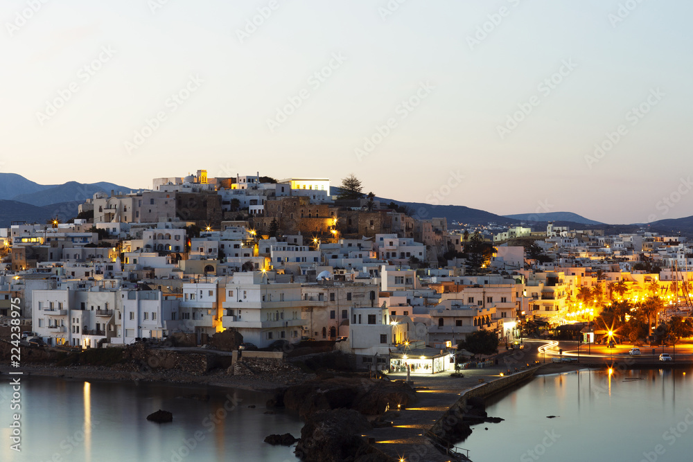 Morning on the Greek island. White traditional houses of the city