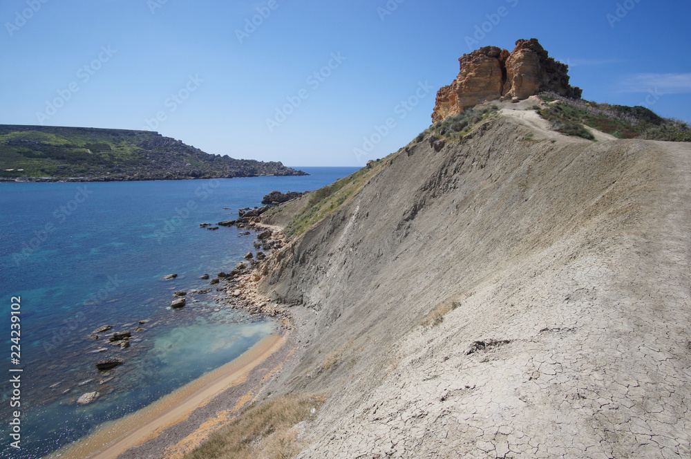 Rocky cliffs of Gnejna Bay, Golden Bay, Malta