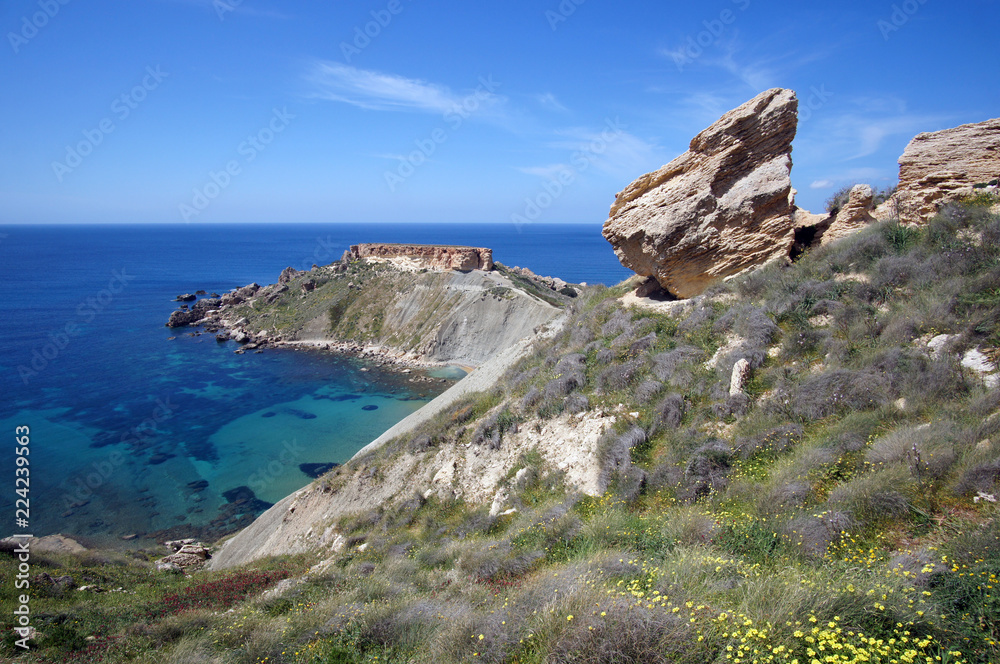 Rocky cliffs of Gnejna Bay, Golden Bay, Malta