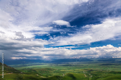 Mountain landscape. High mountain green valley. Suusamyr Valley. Kyrgyzstan