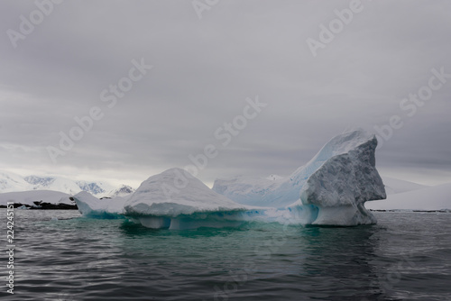 Iceberg in Antarctic sea © Alexey Seafarer