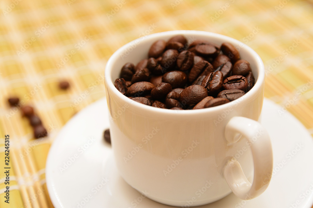 Coffee beans in a cup Coffee beans in a cup