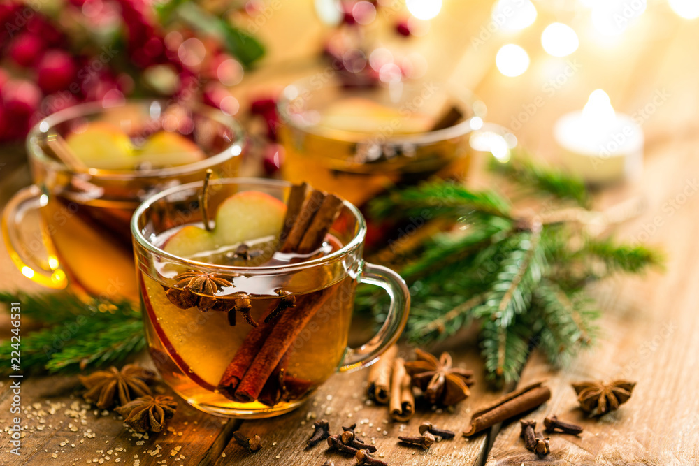 Mulled cider with cinnamon, cloves and anise. Traditional Christmas drink Mulled cider with cinnamon, cloves and anise. Traditional Christmas drink
