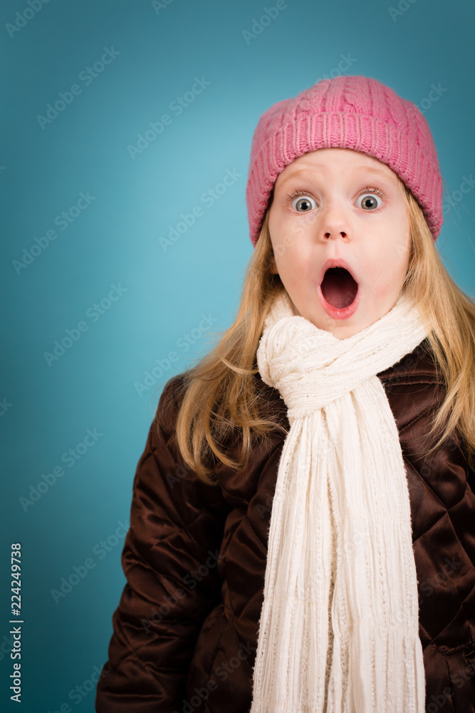 Shocked Little Christmas Girl in Winter Clothing Shocked Little Christmas Girl in Winter Clothing