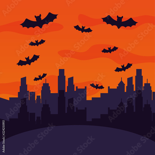 halloween city with bats flying scene