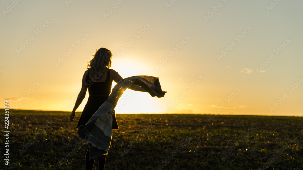 Fototapeta premium Girl Walking Into The Sunset