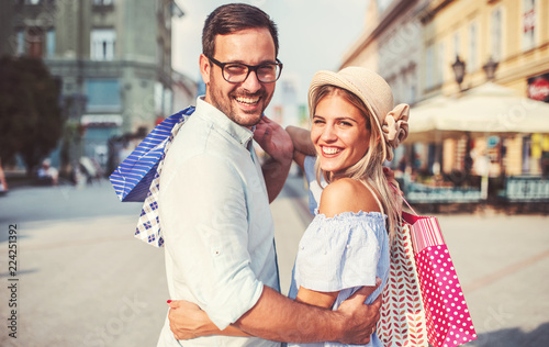 Shopping time. Young couple in shopping. Consumerism, love, dating, lifestyle concept