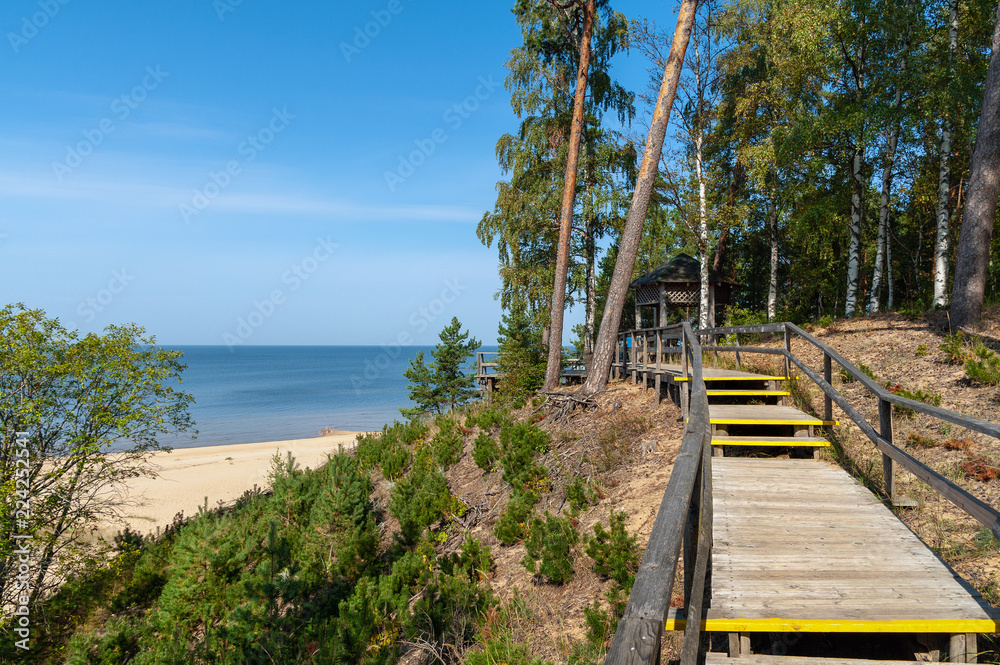 Wooden road to sandy beach of Saulkrasti town in Latvia