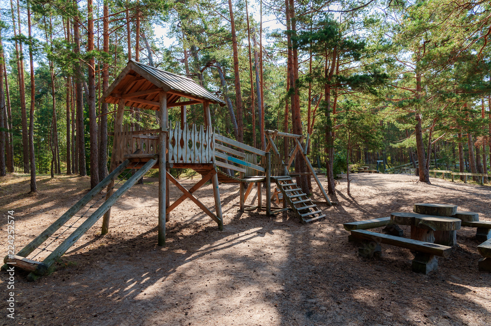 Children play area in pine tree park near Saulkrasti town, Latvia Children play area in pine tree park near Saulkrasti town, Latvia
