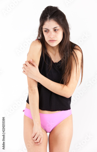 Fear emotional girl on a light background