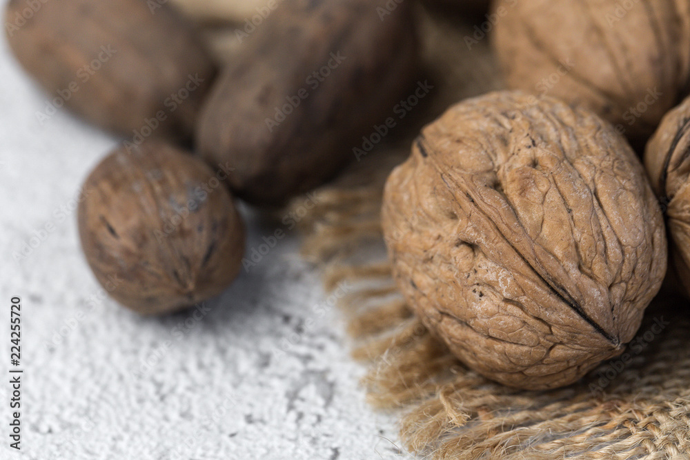 Assortment of nuts. On a light background. Assortment of nuts. On a light background.