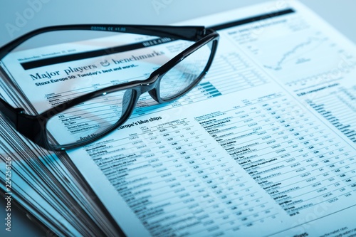 Glasses On Financial Reports Close-up