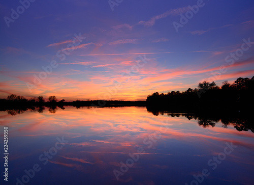 mirrored sunset over lake