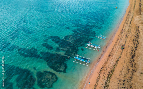 Aerial view of Sanur Beach with Traditional Balinese Fishing Boats, Bali, Indonesia.