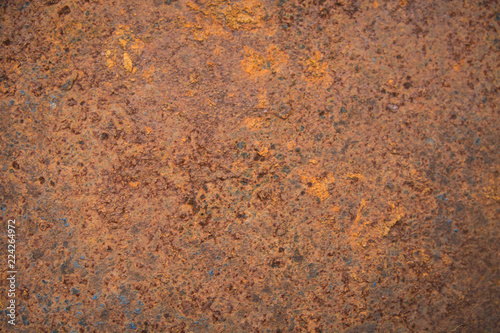 Brown rust stains texture of the old white paint on rusty metal wall. Rusty metal background.
