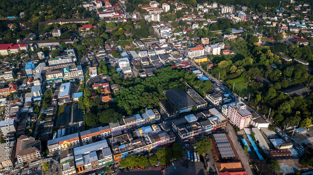 CHIANG MAI, THAILAND- AUGUST 7, 2018 : Top view aerial photo from flying drone of Chiang Mai City with buildings, transportation.