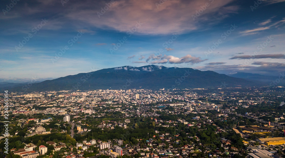 CHIANG MAI, THAILAND- AUGUST 7, 2018 : Aerial Panorama View of Chiang Mai City with sunset and clouds, Thailand.