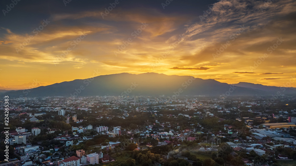 CHIANG MAI, THAILAND- AUGUST 7, 2018 : Aerial Panorama View of Chiang Mai City with sunset and twilight sky.