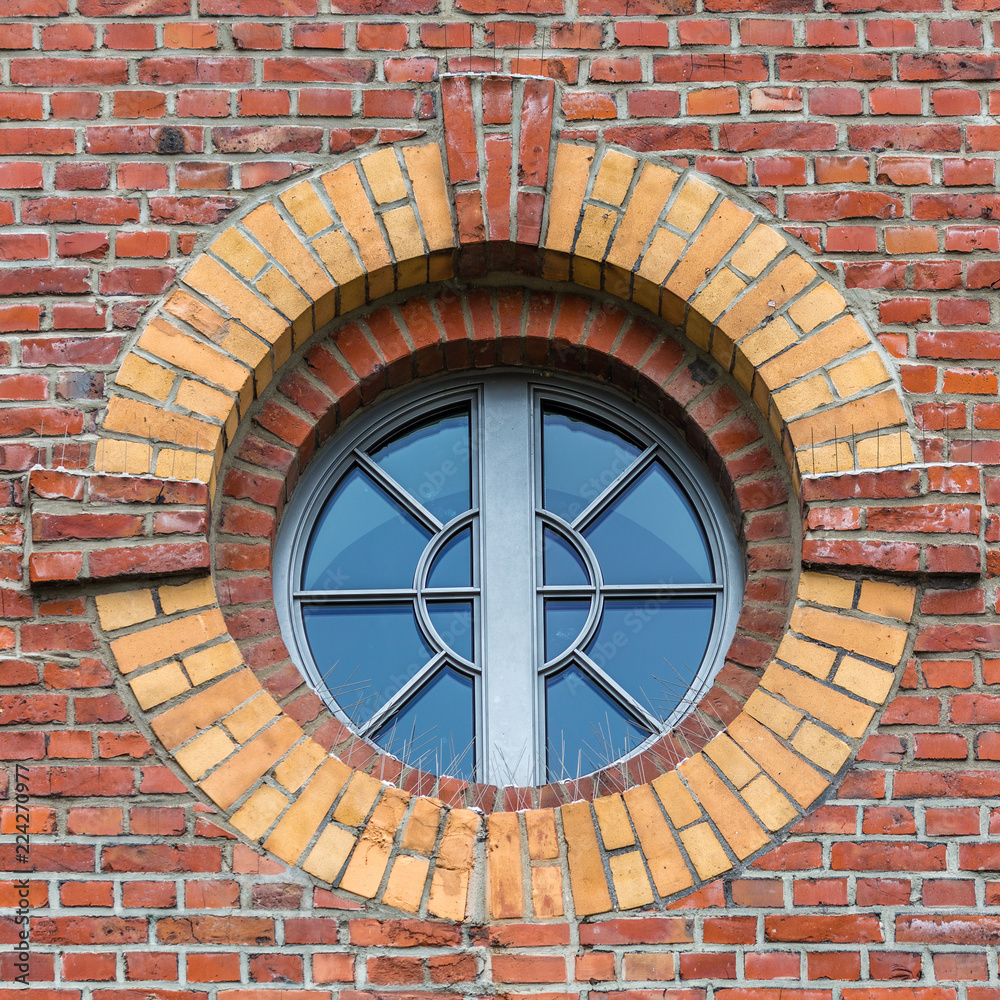 Fototapeta premium WIndow on brick wall