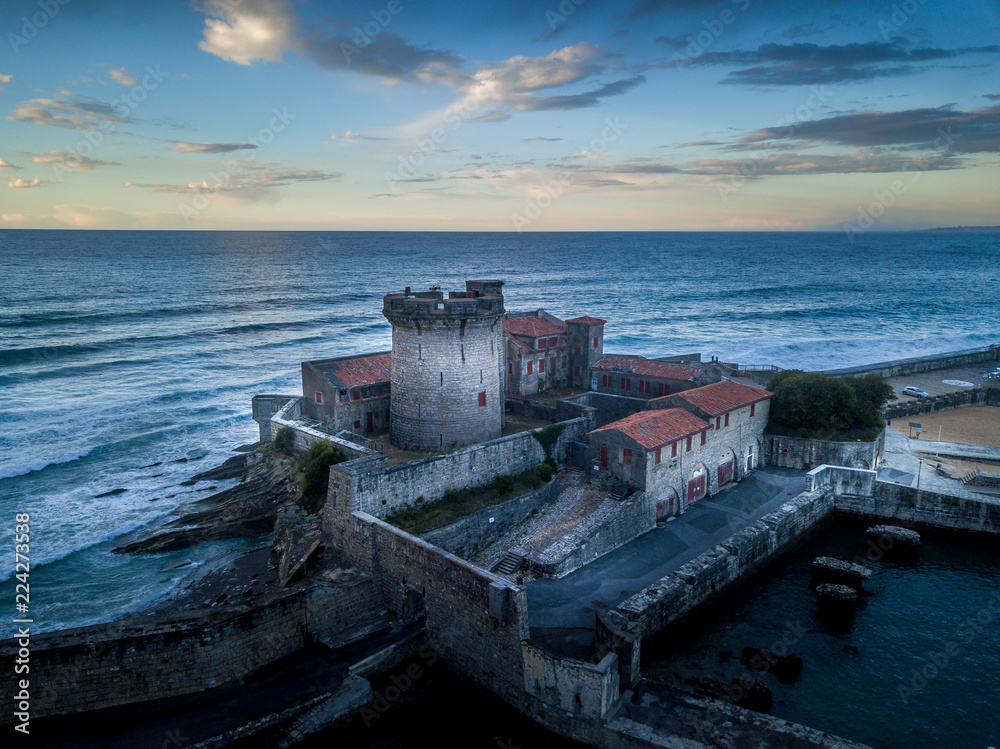 Aerial sunset panorama of Socoa fort at the bottom of the Pyrenees on the Atalntic coast with tower and fortification