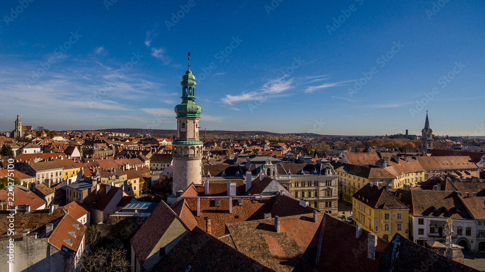 Aerial view of medieval sopron with fire tower and blue sky in Hungary