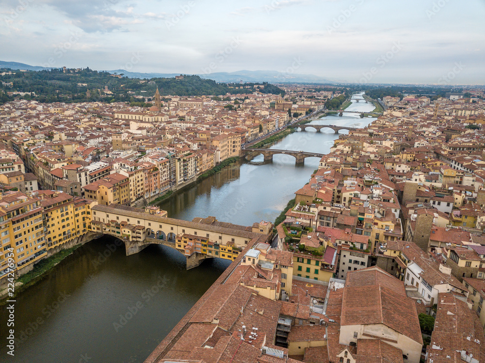 Florence Firenze Ponte vecchio bridge over the Arno river aerial view