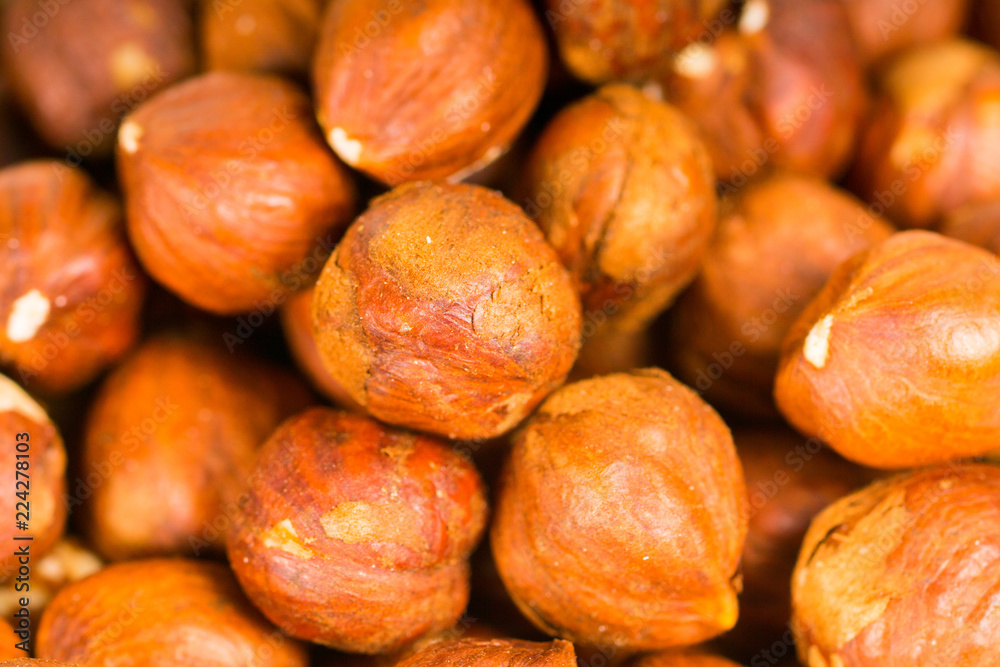 hazelnut kernels in transparent glass bowl hazelnut kernels in transparent glass bowl