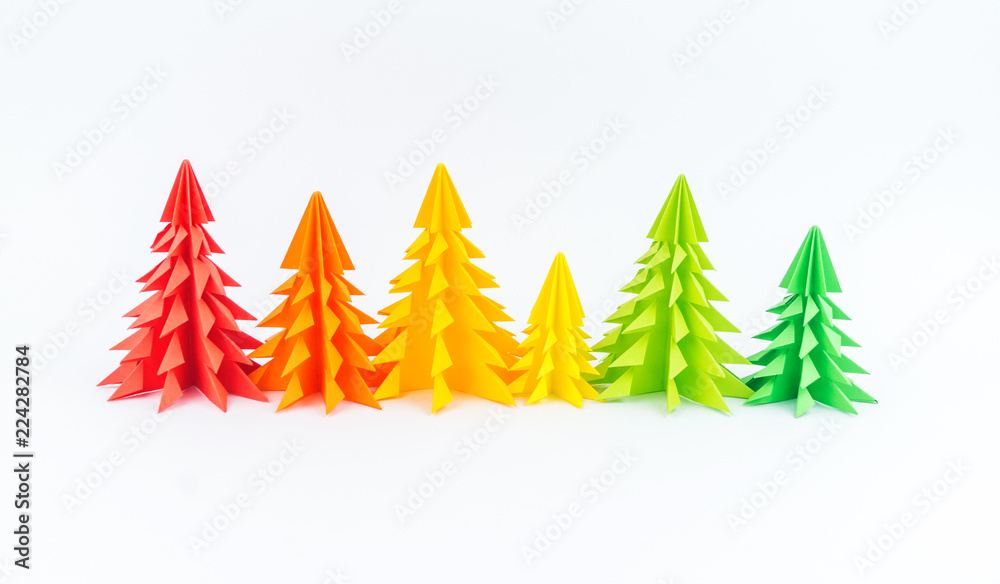 Obraz premium Multicolored paper Christmas tree white background